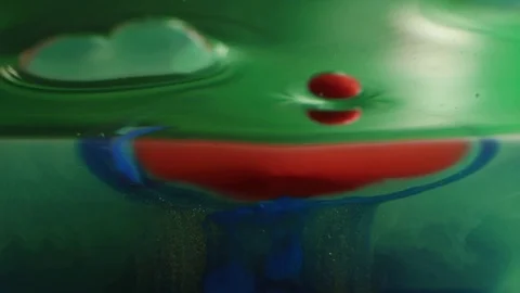 Red Bubble Releases Paint in Liquid MACRO Stock Footage 75467541