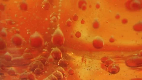 Red Bubbles Floating In Liquid - Background Footage Stock Footage 71215254