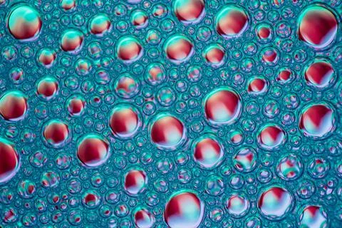Red bubles on blue background Stock Photos