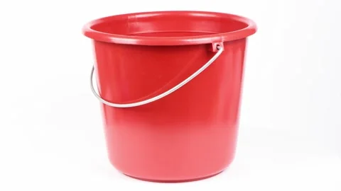 Red bucket isolated on white background. Side view. Loop motion. Stock Footage 165992637