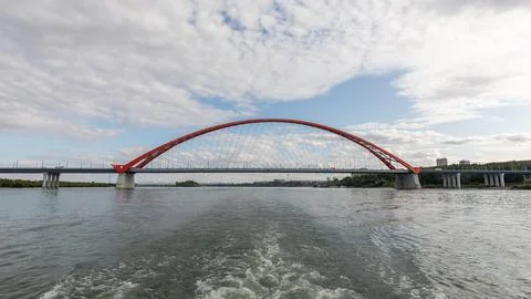 The red Bugrinsky Bridge spans the mighty Ob River near Novosibirsk in Russia Foto stock