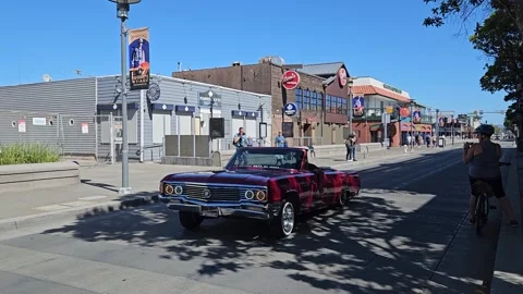 Red Buick Electra convertible, cabriolet car at Fisherman's wharf. San Francisco Видео 284434574