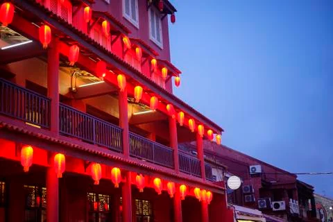 Red building and lantern during blue hour. Stock Photos