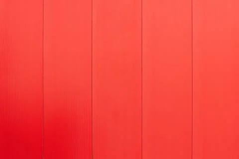 Red building wall modern texture blurred background Fotos de archivo
