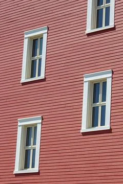 Red building with windows Photos