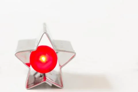 Red bulb in cookie cutter Stock Photos