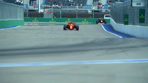 Red Bull Racing chasing Ferrari at Formula 1 Russian Grand Prix 2019 Stock Footage 129393942