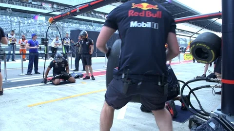 Red Bull Racing Team Formula 1,Max Verstappen crew during Pit Stop Training Stock Footage 129352370