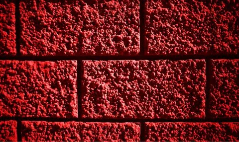 Red bumpy building blocks texture background Stock Photos