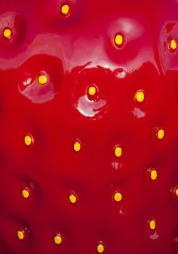 Red bumpy surface with yellow dots Stockfoto's