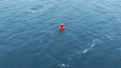 Red Buoy on Blue Ocean Stock Footage 107044520