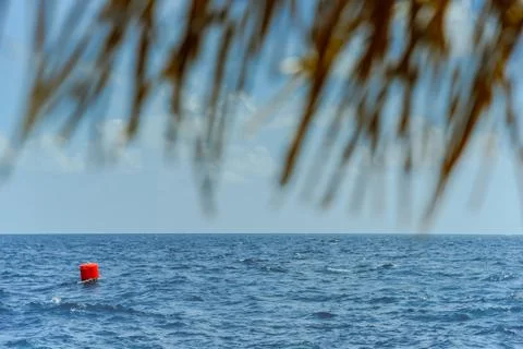 Red buoy Navigation or lateral Marks floating in the sea Stock Photos