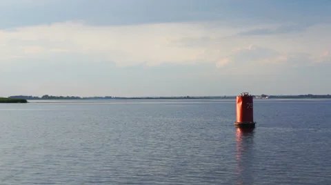 Red buoy on the river Stock Footage 52559169