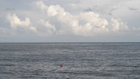 Red buoy in the sea with clouds Stock-Footage 97817632