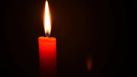 Red burning candle 4K time-lapse Stock Footage 127717171