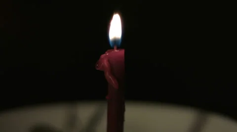 Red burning candle timelapse Stock Footage 34599502