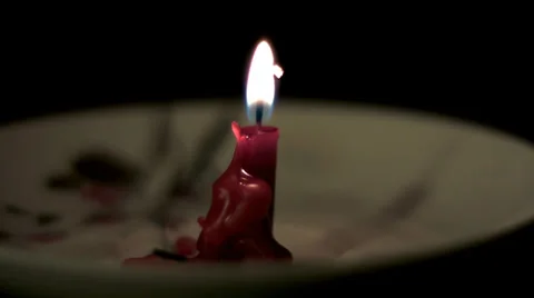 Red burning candle timelapse Stock Footage 34599548
