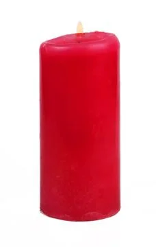 Red burning candle on a white background, isolate, close-up Foto stock