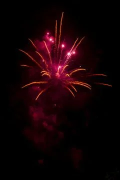 Red bursting firework. Stock Photos