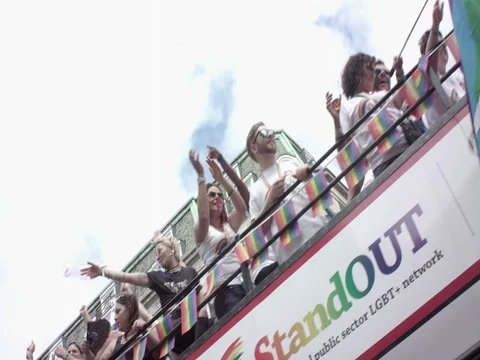 Red bus full of people having fun at Gay Parade Pride London LGBT Stock-Footage 77655839