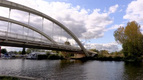 Red bus goes over the bridge on river Thames Stock Footage 118169405