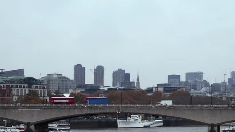 Red bus passing St. Paul's Cathedral Stock Footage 120584328