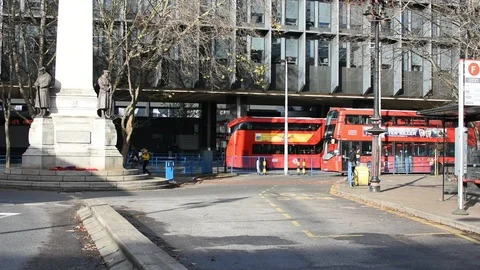 Red bus in the station Stock Footage 99505655