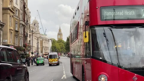 Red Buses Cabs. London Bus Cab Big Ben And Houses Of Parliament Stock Footage 266849264