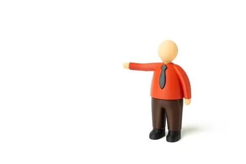 A red businessman points. Space for text. Copy space. Presentation. Directi.. Stockfoto's