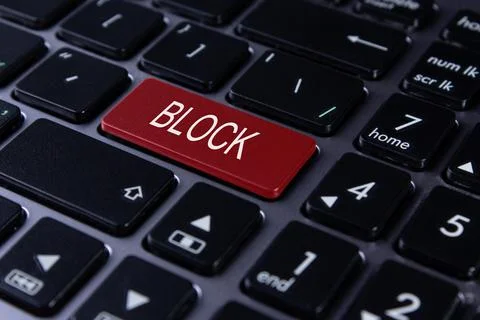 Red button "block" on the laptop keyboard Stock Photos