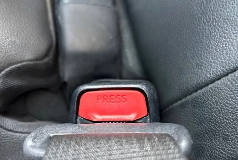 Red button in a car interior. 스톡 사진