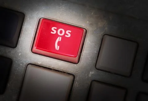 Red button on a dirty old panel Stock Photos