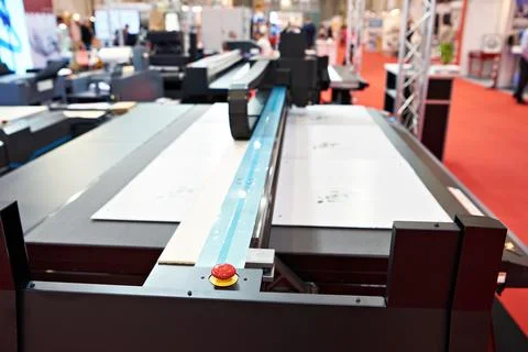 Red button of flatbed cutting plotter Stock Photos