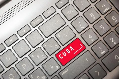 Red button on the PC with the word Cuba Stock Photos