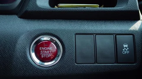 A red button for start the engine of the car. Modern vehicles use a remote .. Stock Photos