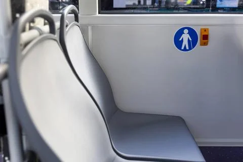 Red button STOP and Elderly (Old) People sign on the bus Red button STOP o... Photos