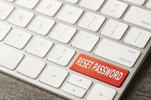 Red button with text RESET PASSWORD on keyboard, closeup view Stock Photos