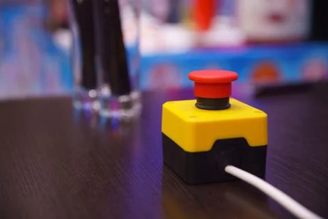 Red button with yellow stand Stock Photos