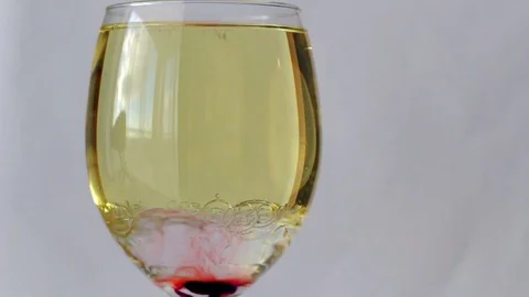 Red buzzing bubbles experiment Stock Footage 70420083