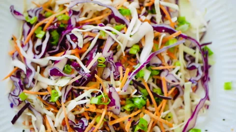 Red cabbage and carrot vegetable salad Stock Footage