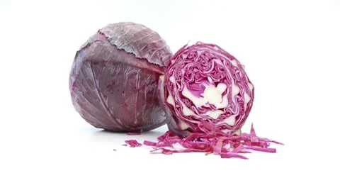 Red cabbage with cuttings on white Stock Footage 8979373