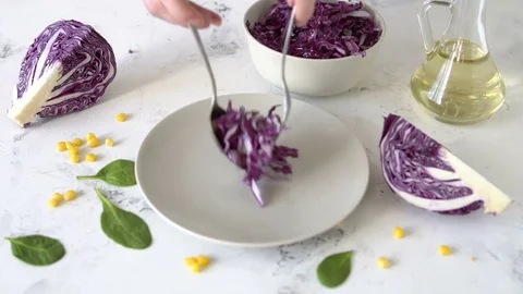 Red cabbage salad in the plate. Stock Footage 84384605