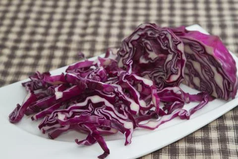 Red cabbage slice on white plate Stock Photos