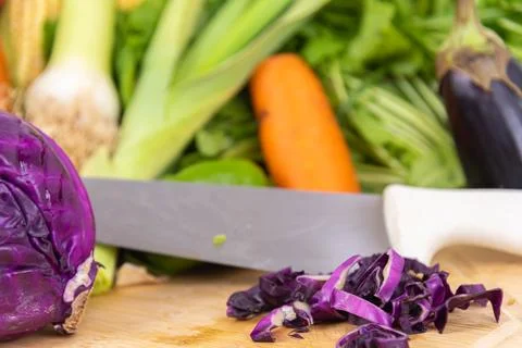 Red cabbage vegetable on top of chopping board Stock Photos
