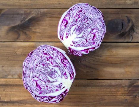 Red cabbage on a wooden table Stock Photos