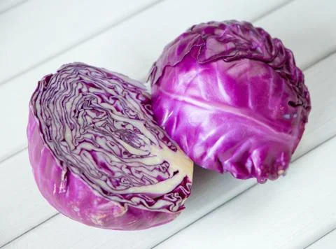 Red cabbage on a wooden table Stock Photos