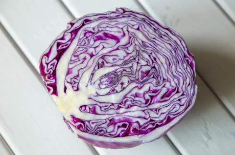 Red cabbage on a wooden table Stock Photos