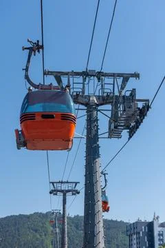 Red Cable Car against the blue sky Stock Photos
