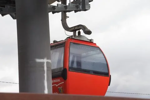 Red Cable Car on Cloudy Day Stock Photos