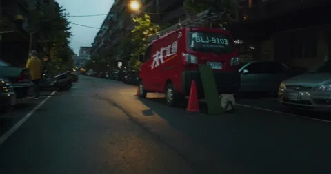 Red Cable Television Service Van On The Side Of An Old Urban Street(Graded) Stock Footage 226106330